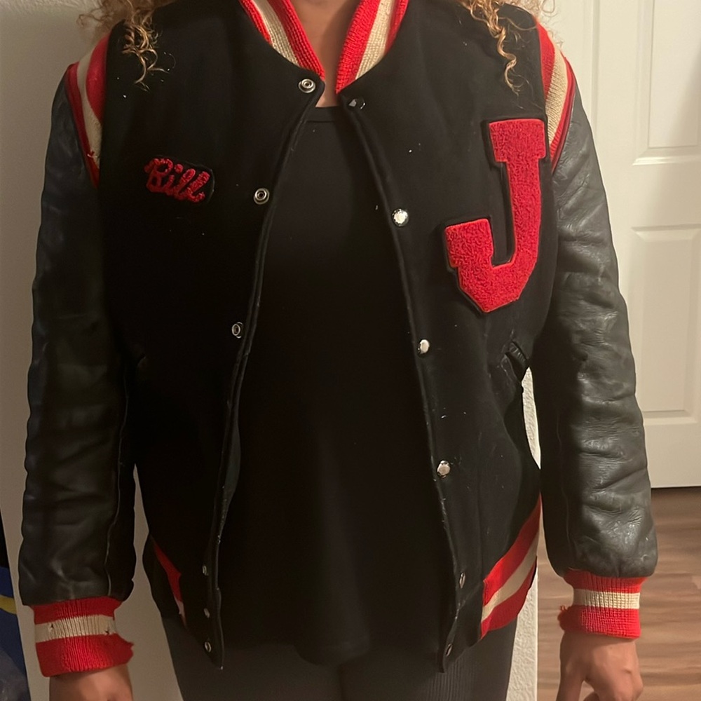 Red and black varsity skookum Jacket